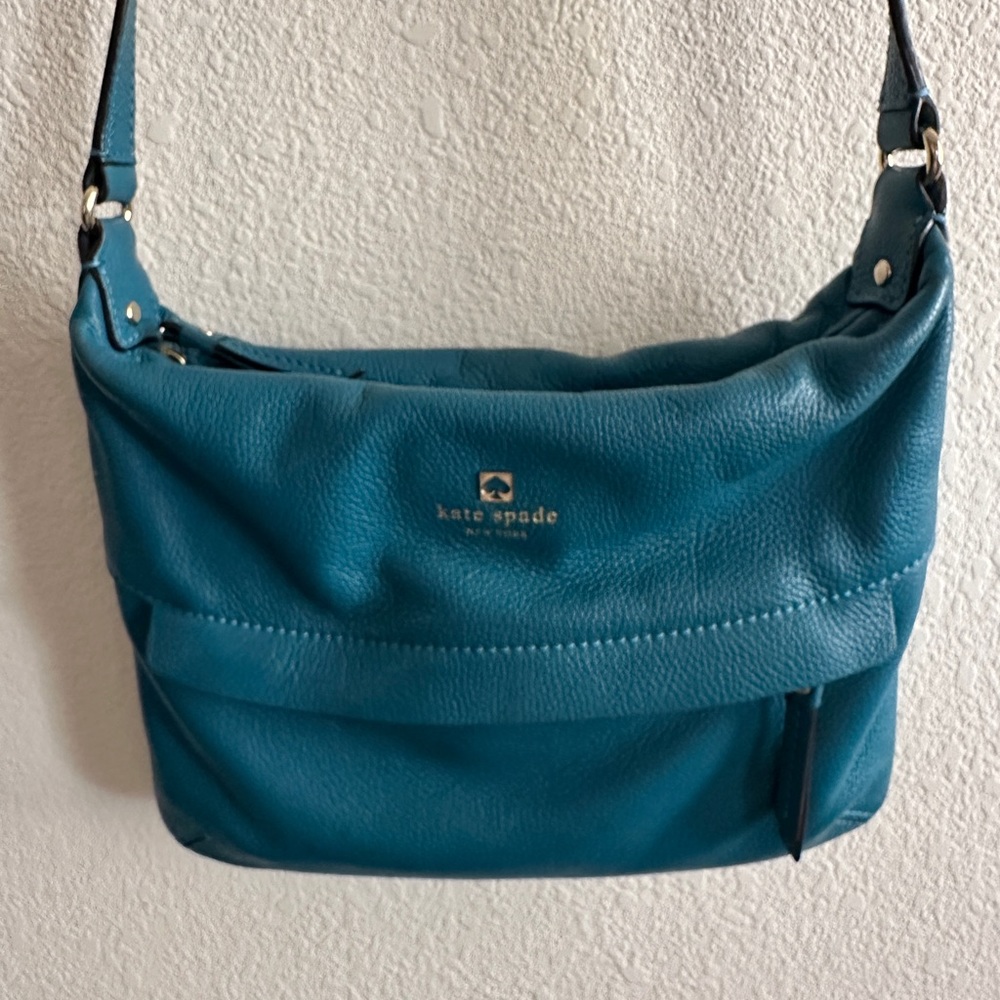 Kate Spade aqua turquoise blue authentic leather crossbody handbag.